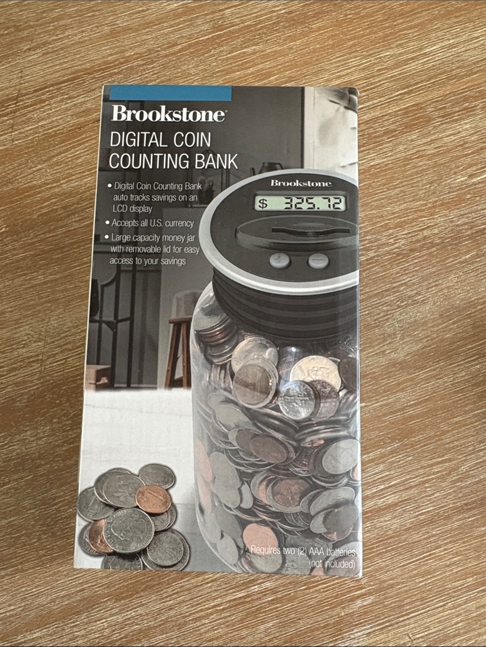 New In Box Brookstone Clear Coin Counting Bank with Black/Silver Lid